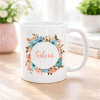 Valge kruus Silvia nime ja lillemustriga, ideaalne kingituseks.